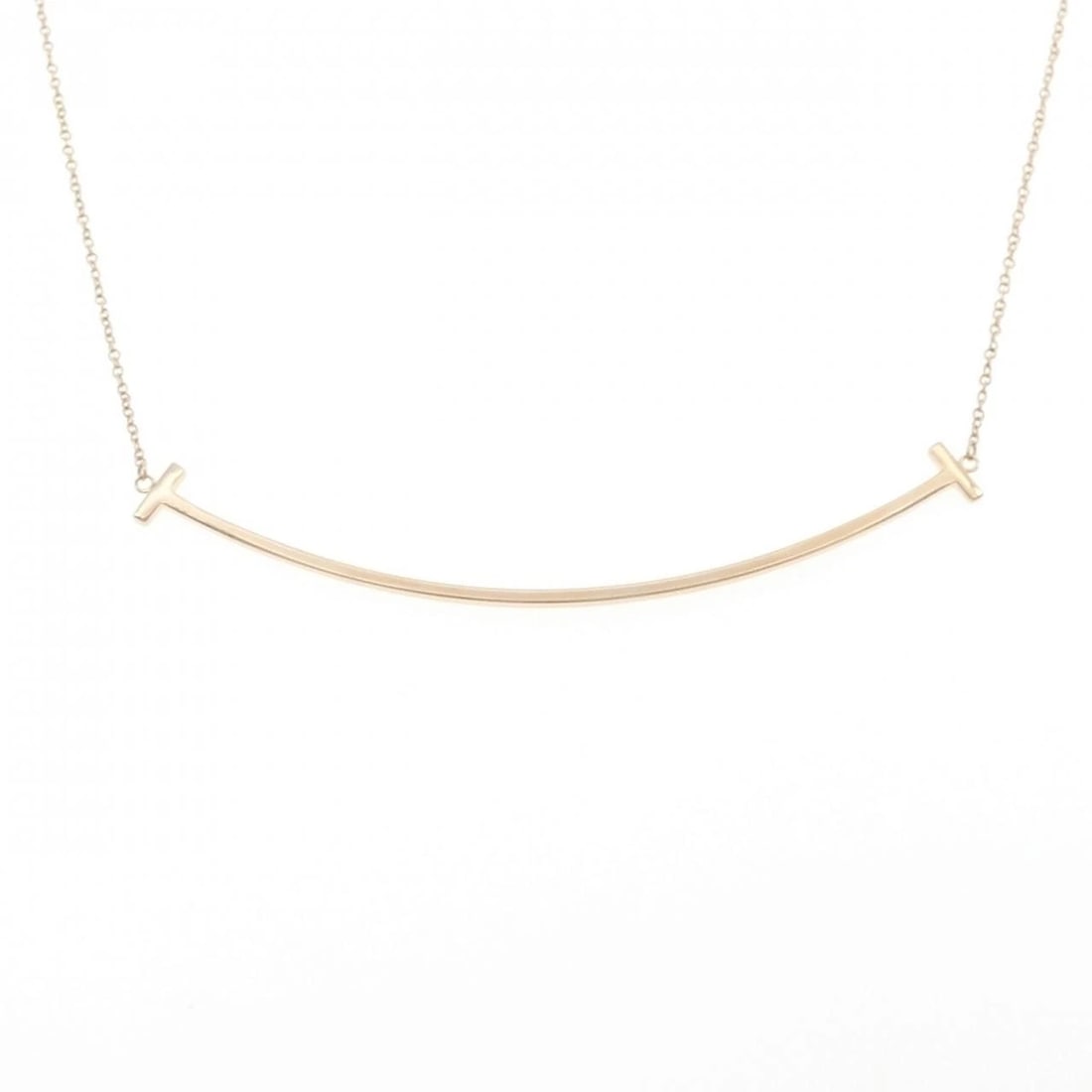 TIFFANY T SMILE LARGE NECKLACE: Tiffany T Smile Large Necklace Brand: Tiffany Type: Necklace Material: 750 Pink Gold Color: Pink Gold Size: 42/47cm Accessories: None Accessories Notice: When purchasing pre-owned goods, p