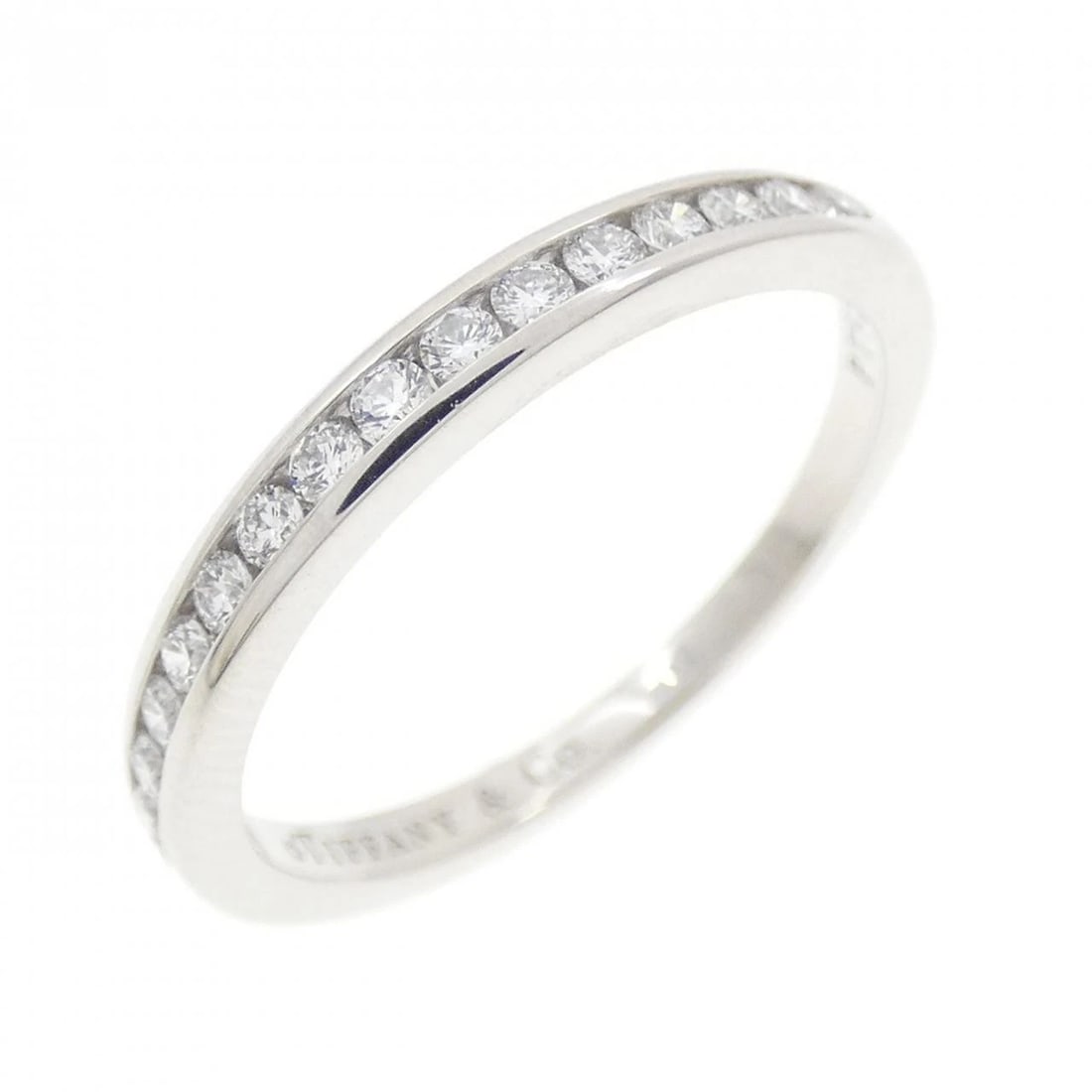 TIFFANY & CO. HALF CIRCLE CHANNEL SETTING RING: Tiffany & Co. half Circle channel setting Ring Brand: Tiffany Type: Ring Material: Platinum 950 Main Stone/Creation Natural Color: Platinum Size: 5 (US size) Accessories: None Accessories