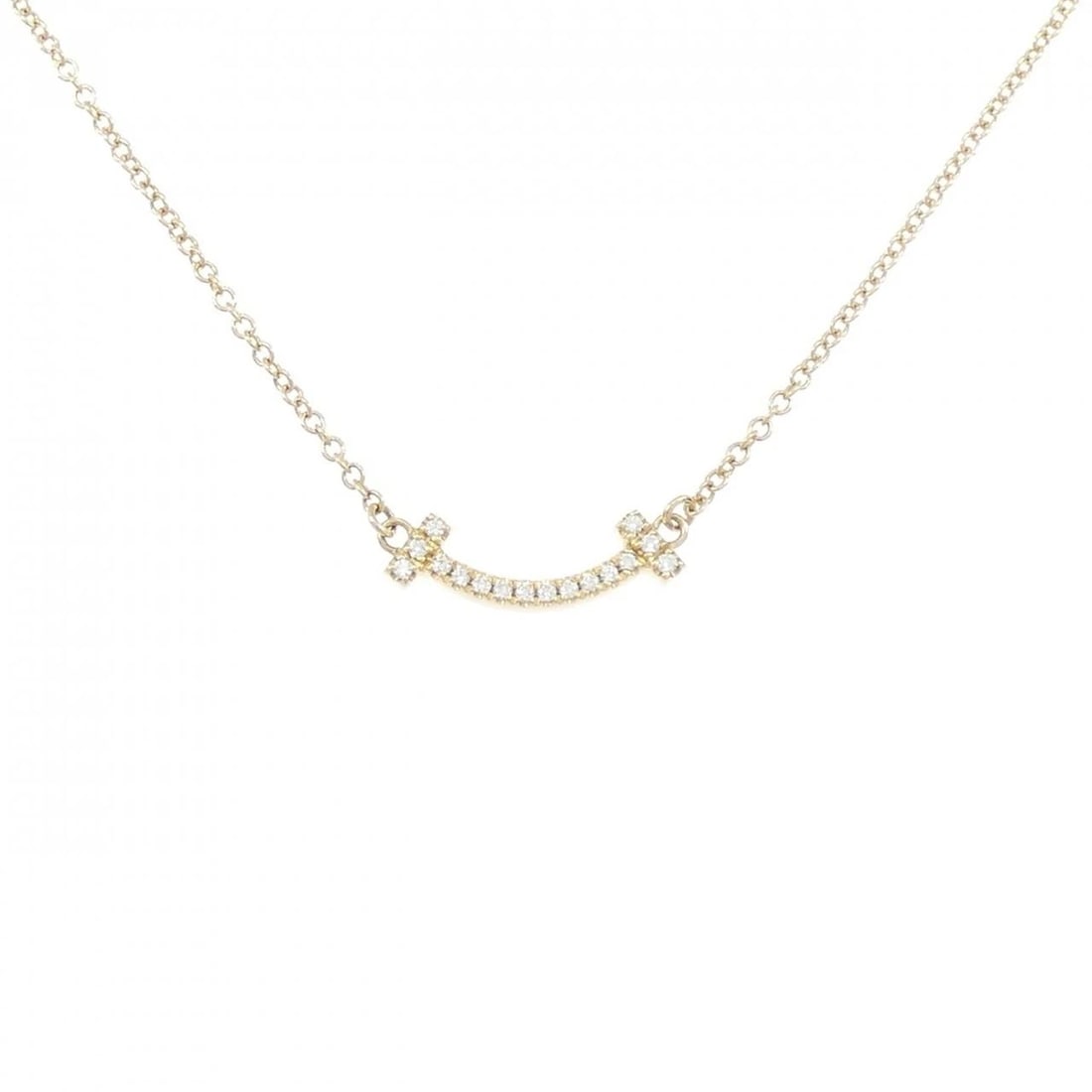 TIFFANY T SMILE MINI NECKLACE: Tiffany T Smile mini Necklace Brand: Tiffany Type: Necklace Material: 750 Yellow Gold Main Stone/Creation Natural Color: Yellow Gold Size: 41/46cm Accessories: None Accessories Notice: When