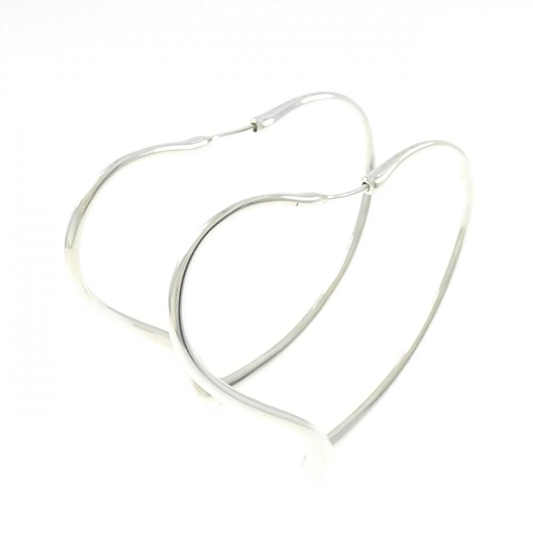 TIFFANY OPEN HEART HOOP EARRINGS: Tiffany Open Heart Hoop Earrings Brand: Tiffany Type: Earrings Material: 925 Silver Color: Silver Size: ActualSize HxW: 46.3mmx5.6mm Accessories: None Accessories Notice: When purchasing