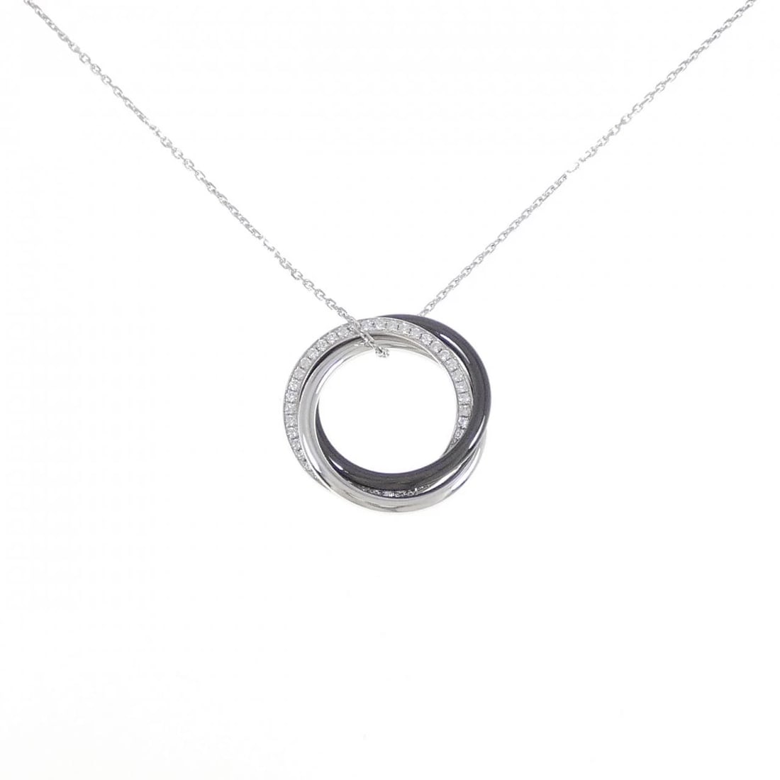 CARTIER TRINITY BLACK AND WHITE NECKLACE: Cartier Trinity Black and White Necklace Brand: Cartier Type: Necklace Material: 750 White Gold ceramic Main Stone/Creation Natural Color: White Gold ceramic Size: 42 45cm Accessories: None