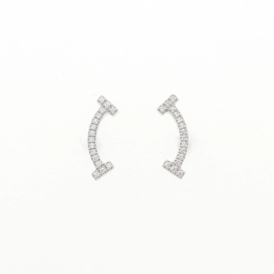 TIFFANY T SMILE EARRINGS: Tiffany T Smile Earrings Brand: Tiffany Type: Earrings Material: 750 White Gold Main Stone/Creation Natural Color: White Gold Size: ActualSize HxW: 13.0mmx4.2mm Accessories: None Accessories