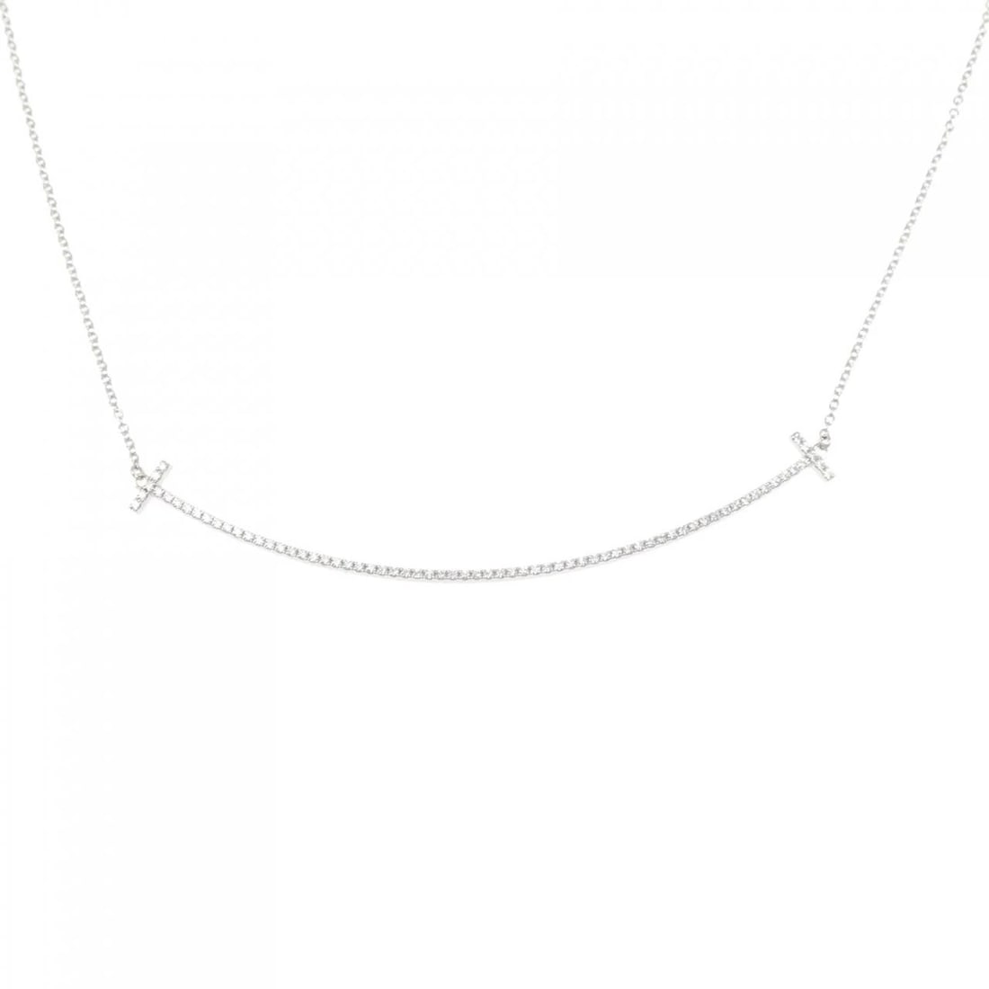 TIFFANY T SMILE LARGE NECKLACE: Tiffany T Smile Large Necklace Brand: Tiffany Type: Necklace Material: 750 White Gold Main Stone/Creation Natural Color: White Gold Size: 41 45cm Accessories: None Accessories Notice: When