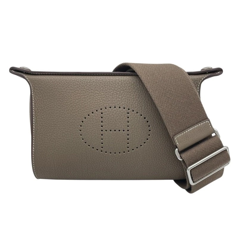 HERMES VIDPOSH B STAMP ETOUPE SHW TOGO SHOULDER BAG: HERMES VidPosh B Stamp Etoupe SHW Togo Shoulder Bag Brand: HERMES Type/Style: Handbag Material: Togo Color: Etoupe SV Hardware Size: W: 20.5cm / H: 14cm / D: 2cm / Shoulder: up to 120cm Accessori