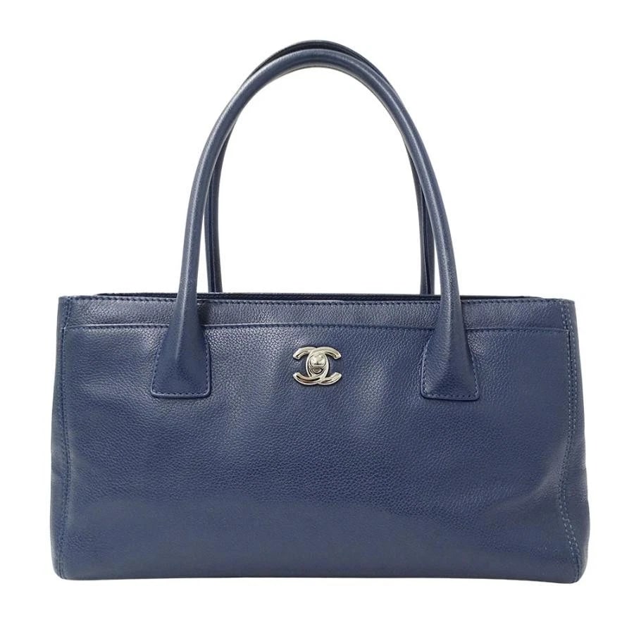 CHANEL CALFSKIN EXECUTIVE TOTE BLUE: Chanel Calfskin Executive Tote Blue Brand: Chanel Type/Style: Handbag Material: Calf Color: Blue/Silver Hardware Size: W: 31cm (bottom) / H: 19cm / D: 14cm (lower side) / Handle: 49cm Accessories