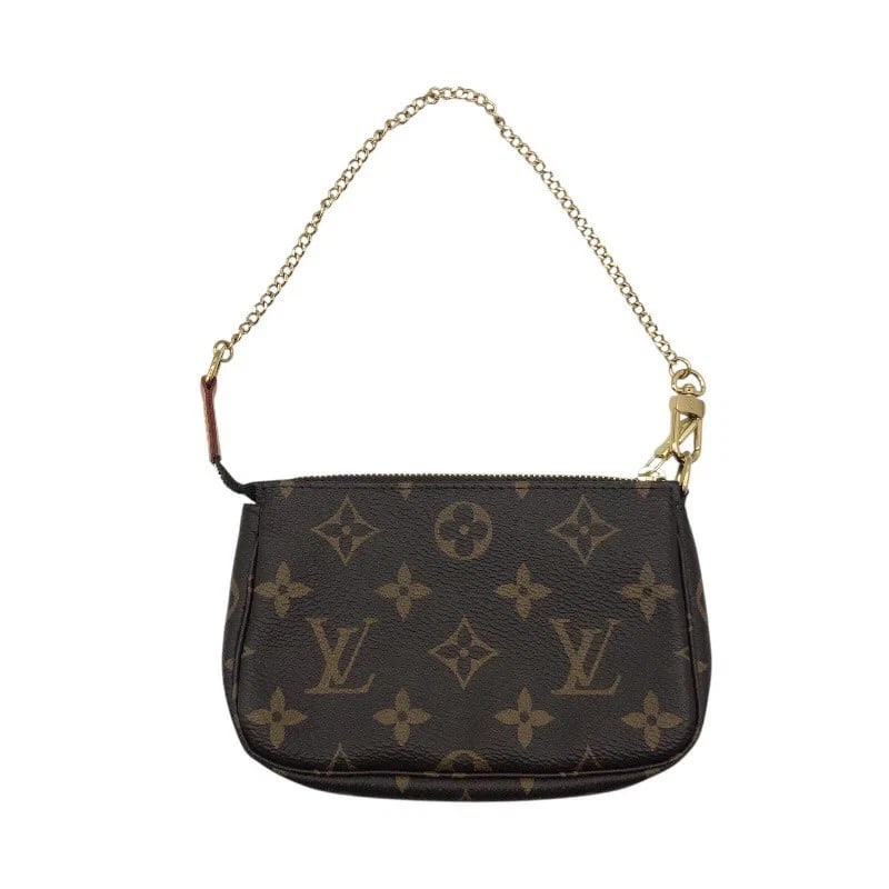 LOUIS VUITTON MINI POCHETTE ACCESSOIRES BROWN MONOGRAM: LOUIS VUITTON Mini Pochette Accessoires Brown Monogram Brand: LOUIS VUITTON Type/Style: Handbag Material: Monogram Color: Brown Size: W: 14cm / H: 9.5cm / D: 2cm Accessories: None Accessories