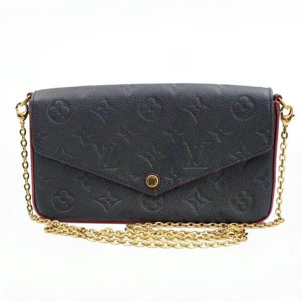 LOUIS VUITTON POCHETTE FÉLICIE MONOGRAM EMPREINTE IN MARINE ROUGE: Louis Vuitton Pochette Félicie Monogram Empreinte in Marine Rouge Brand: Louis Vuitton Type/Style: Handbag Material: Monogram Empreinte Color: Navy Size: W:21cm × H:13cm × D:3.5cm /