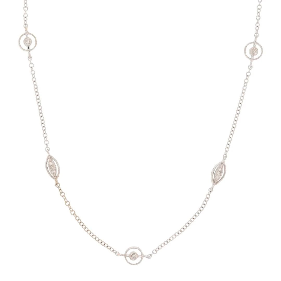 DIAMOND MARQUISE SHAPED STATION NECKLACE: Diamond Marquise Shaped Station Necklace Brand: Unbranded Type: Necklace Material: 18k White Gold Main Stone/Creation Natural Color: None Size: Necklace Measurement: 16 - 18" Length / 1.3 -