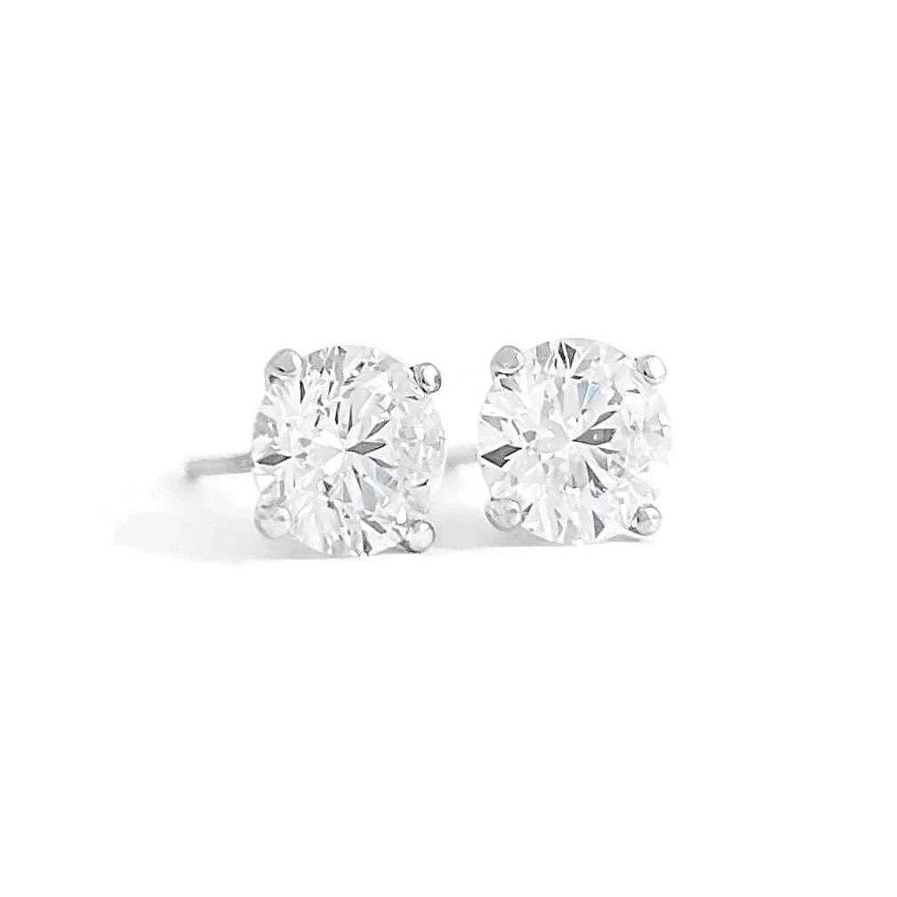 ROUND LAB-CREATED DIAMOND STUD EARRINGS 14K WHITE GOLD: Round Lab-Created Diamond Stud Earrings 14K White Gold Brand: Unbranded Type: Earrings Material: 14K White Gold Main Stone/Creation Lab-Created Color: White Size: Measurements: 6.4 mm 