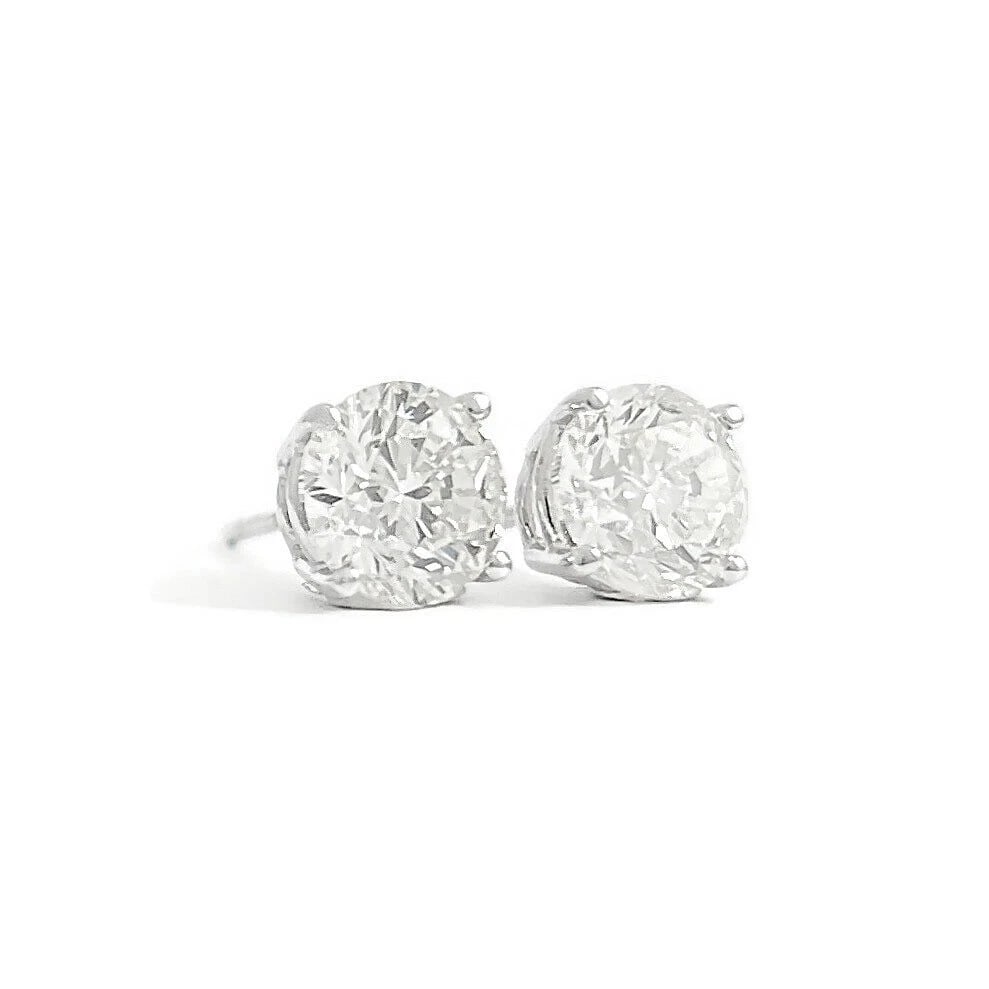ROUND DIAMOND STUD EARRINGS 14K WHITE GOLD: Round Diamond Stud Earrings 14K White Gold Brand: Unbranded Type: Earrings Material: 14K White Gold Main Stone/Creation Natural Color: White Size: Measurements: 6.1 - 6.2 mm Accessories: None