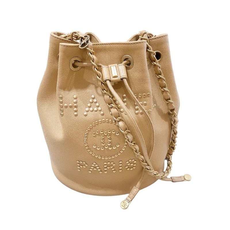 CHANEL DEAUVILLE SHOULDER BAG: CHANEL Deauville Shoulder Bag Brand: CHANEL Type: Shoulder Bag Material: Exterior Material Caviar skin/studs Color: Beige Gold Hardware Size: W9.4 x H8.7x D5.7inch Shoulder:46.5inch Accessories: