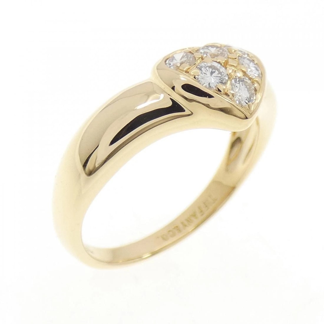 TIFFANY & CO. PAVE HEART RING: Tiffany & Co. Pave Heart Ring Brand: Tiffany Type: Ring Material: 750 Yellow Gold Main Stone/Creation Natural Color: Yellow Gold Size: 5.5 (US size) Accessories: None Accessories Notice: When