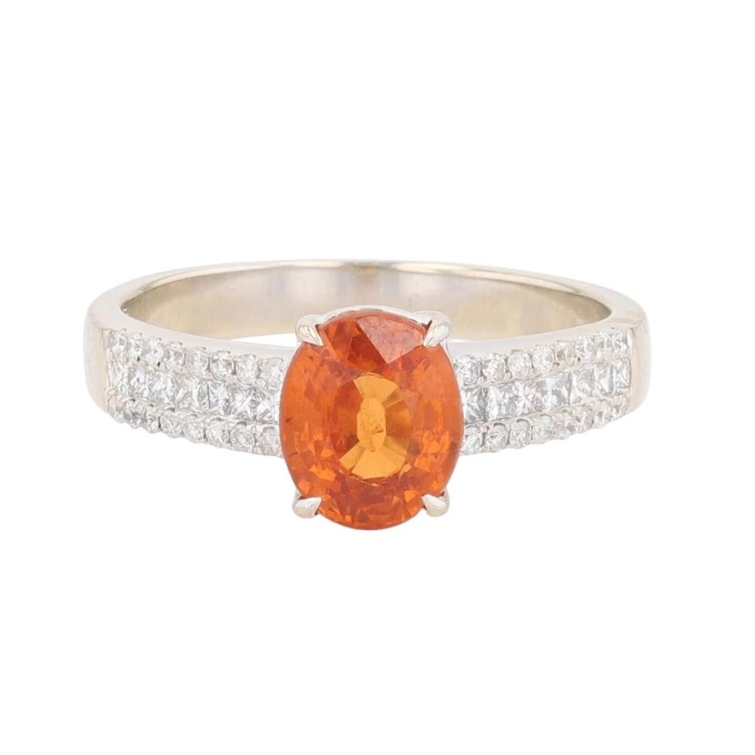 OVAL SPESSARTINE GARNET W/ DIAMOND ACCENTS RING: Oval Spessartine Garnet w/ Diamond Accents Ring Brand: Unbranded Type: Ring Material: 14k White Gold Main Stone/Creation Natural Color: Main Stone Color: Medium Dark Very Slightly Brownish Reddish