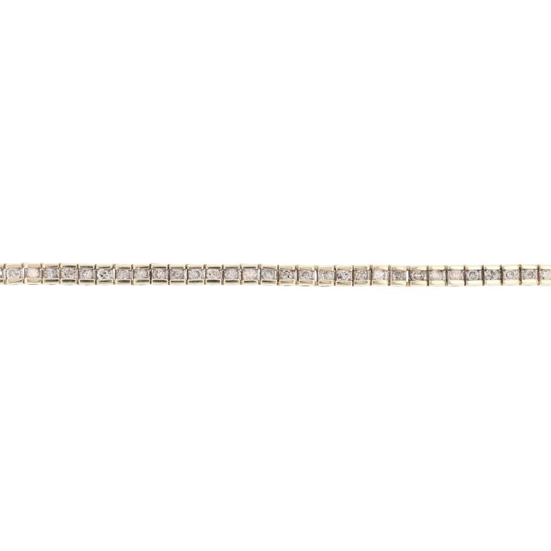 ROUND CUT DIAMOND TENNIS BRACELET 14K YELLOW GOLD: Round Cut Diamond Tennis Bracelet 14k Yellow Gold Brand: Unbranded Type: Bracelet Material: 14k Yellow Gold Main Stone/Creation Natural Color: None Size: Bracelet Measurement: 7" Length / 3mm 