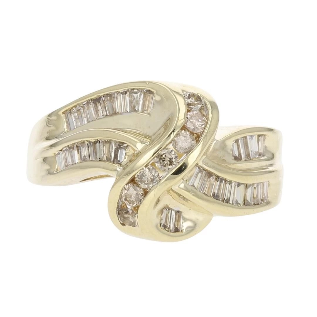 ROUND AND BAGUETTE DIAMOND CHANNEL-SET SWIRL RING (1 of 2)