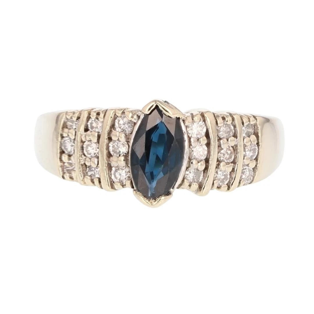 MARQUISE CUT SAPPHIRE WITH DIAMOND ACCENTS RING (1 of 2)