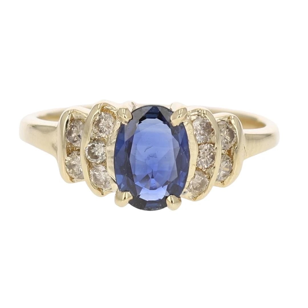 OVAL CUT SAPPHIRE WITH DIAMOND ACCENTS RING (1 of 2)
