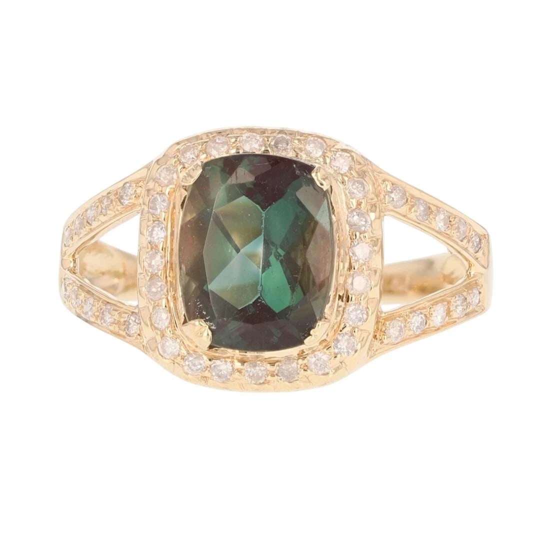 CUSHION CUT GREEN SUNSTONE WITH DIAMOND HALO RING: Cushion Cut Green Sunstone with Diamond Halo Ring Brand: Unbranded Type: Ring Material: 14k Yellow Gold Main Stone/Creation Natural Color: Main Stone Color: Medium Dark Very Slightly Grayish