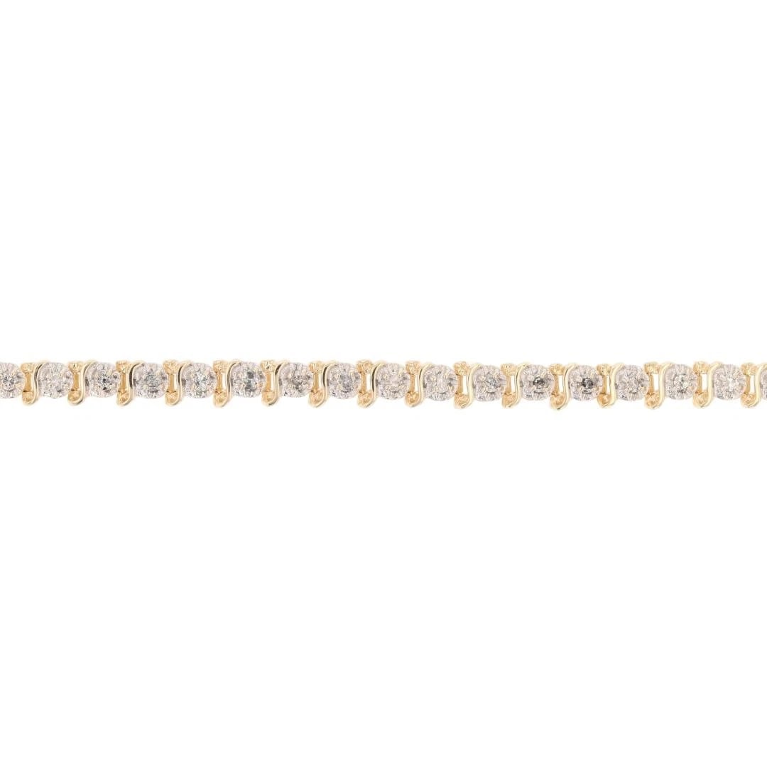 ROUND DIAMOND TENNIS BRACELET 14K MULTI-TONE GOLD: Round Diamond Tennis Bracelet 14k Multi-Tone Gold Brand: Unbranded Type: Bracelet Material: 14k Multi-Tone Gold Main Stone/Creation Natural Color: None Size: Bracelet Measurement: 7" Length /