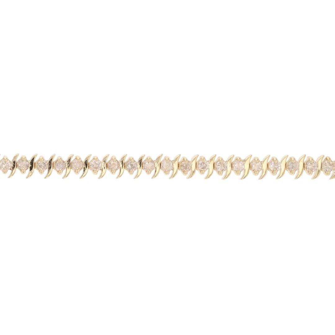 ROUND CUT DIAMOND TENNIS BRACELET 14K YELLOW GOLD: Round Cut Diamond Tennis Bracelet 14k Yellow Gold Brand: Unbranded Type: Bracelet Material: 14k Yellow Gold Main Stone/Creation Natural Color: None Size: Bracelet Measurement: 7" Length /