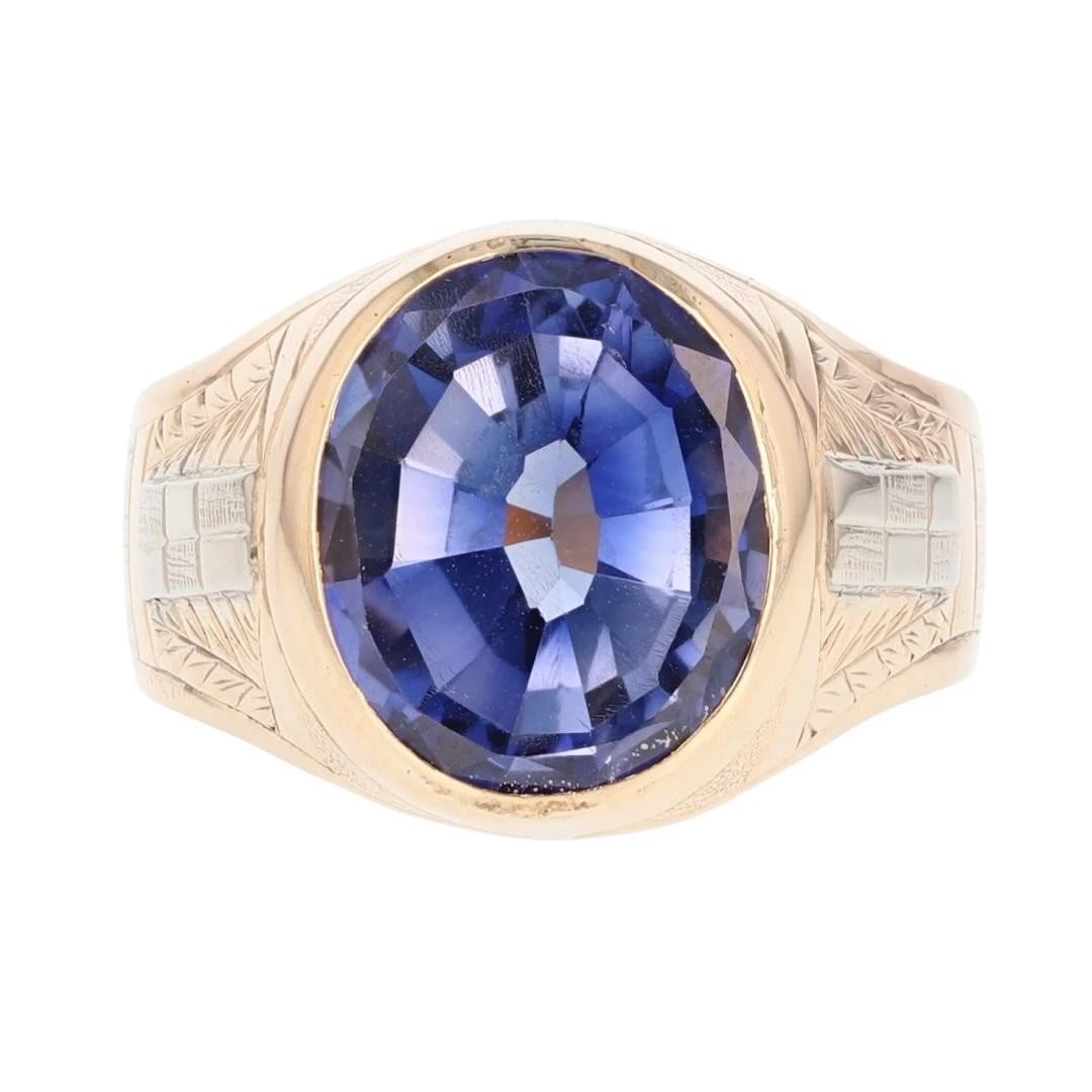 LAB-CREATED SAPPHIRE SOLITAIRE STATEMENT RING: Lab-Created Sapphire Solitaire Statement Ring Brand: Unbranded Type: Ring Material: 10k Multi-Tone Gold Main Stone/Creation Sapphire Color: Main Stone Color: Medium Dark Grayish Bluish Violet 