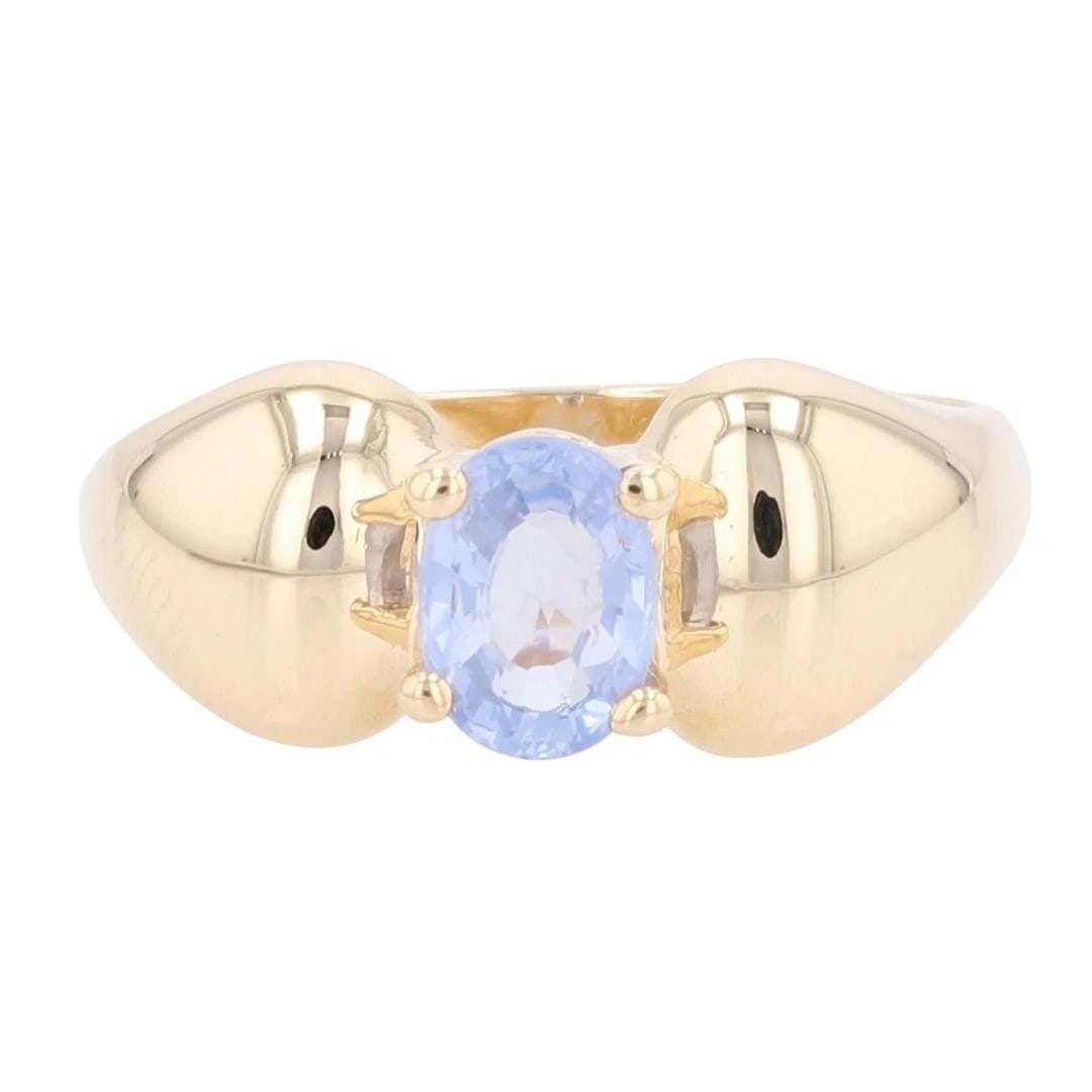 OVAL LIGHT BLUE SAPPHIRE SOLITAIRE STATEMENT RING: Oval Light Blue Sapphire Solitaire Statement Ring Brand: Unbranded Type: Ring Material: 14k Yellow Gold Main Stone/Creation Natural Color: Main Stone Color: Light Blue Size: 9 US Accessories: Non