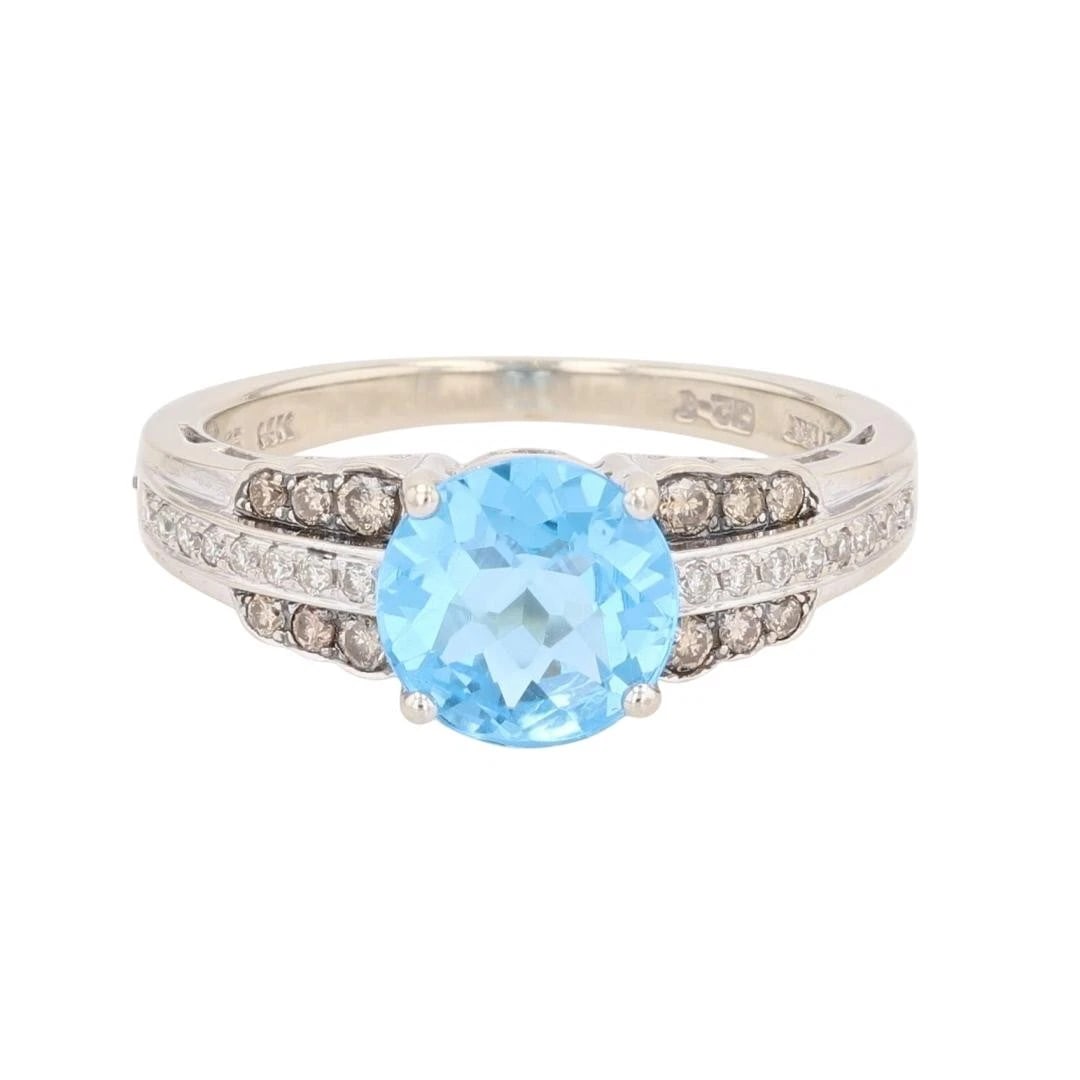 LE VIAN FANCY CUT BLUE TOPAZ WITH DIAMOND ACCENTS RING: Le Vian Fancy Cut Blue Topaz with Diamond Accents Ring Brand: Le Vian Type: Ring Material: 14k White Gold Main Stone/Creation Blue Topaz Color: Main Stone Color: Blue Size: 6.75 US 