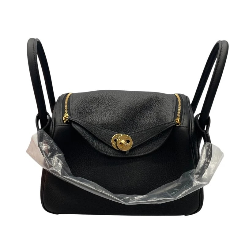 HERMES LINDY 26 HANDBAG: HERMES Lindy 26 Handbag Brand: HERMES Type: Handbag Material: Taurillon Clemence Color: GDHardware Size: W10.2 x H7.1x D5.5inch Accessories: None Accessories Notice: When purchasing pre-ow