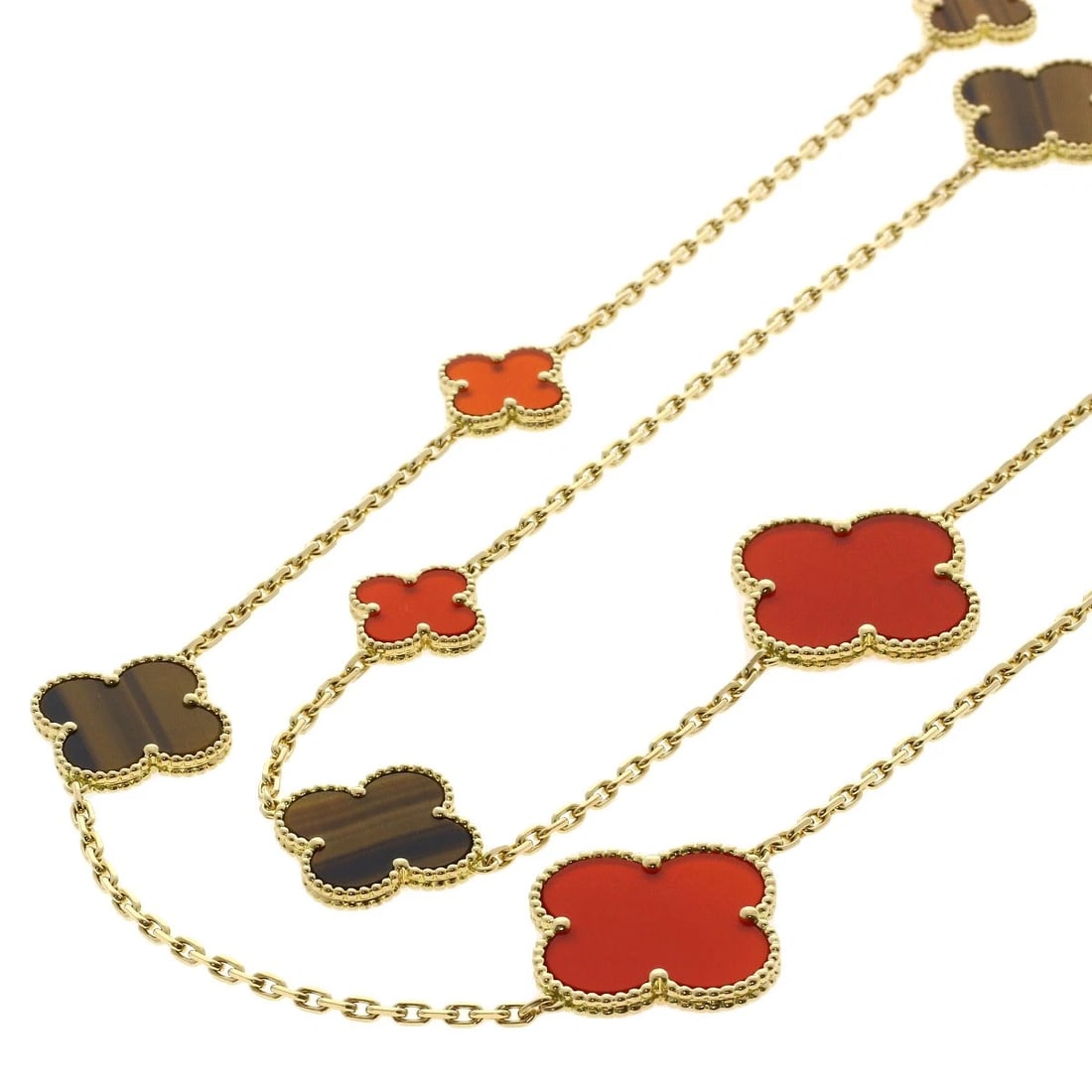 VAN CLEEF & ARPELS MAGIC ALHAMBRA TIGER'S EYE CARNELIAN NECKLACE: Van Cleef & Arpels Magic Alhambra Tiger's Eye Carnelian Necklace Brand: Van Cleef & Arpels Type: Necklace Material: K18 Yellow Gold Main Stone/Creation Tiger's Eye Color: Yellow Gold Size: Chain L
