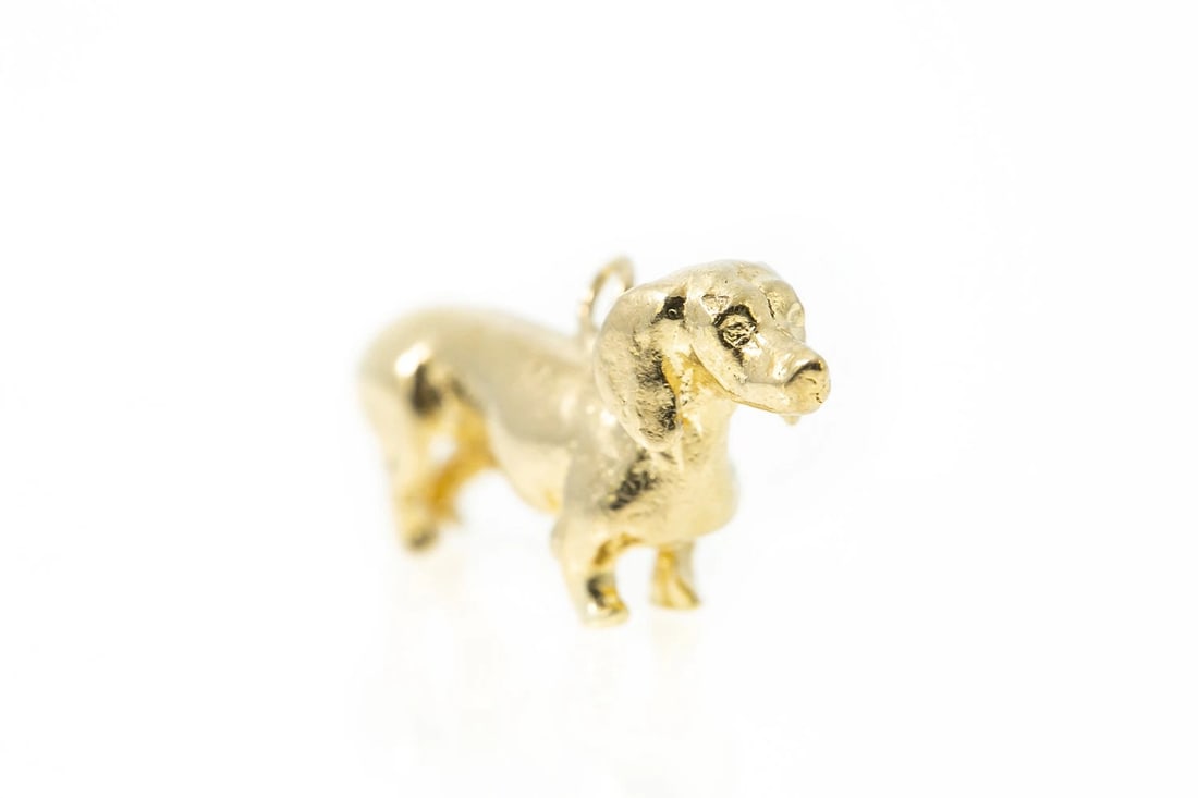 DACHSHUND 14K YELLOW GOLD CHARM PENDANT: Dachshund 14k Yellow Gold Charm Pendant Brand: Unbranded Type: Charm Material: 14k Yellow Gold, Color: Yellow Size: Length x Width - 0.40" x 1.00" Accessories: None Accessories Notice: When