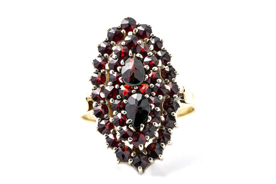 VICTORIAN REVIVAL BOHEMIAN GARNET 18K YELLOW GOLD RING: Victorian Revival Bohemian Garnet 18K Yellow Gold Ring Brand: Unbranded Type: Ring Material: 18K Yellow Gold Main Stone/Creation Almandine Garnet Color: Yellow Size: 7.25 US Accessories: None