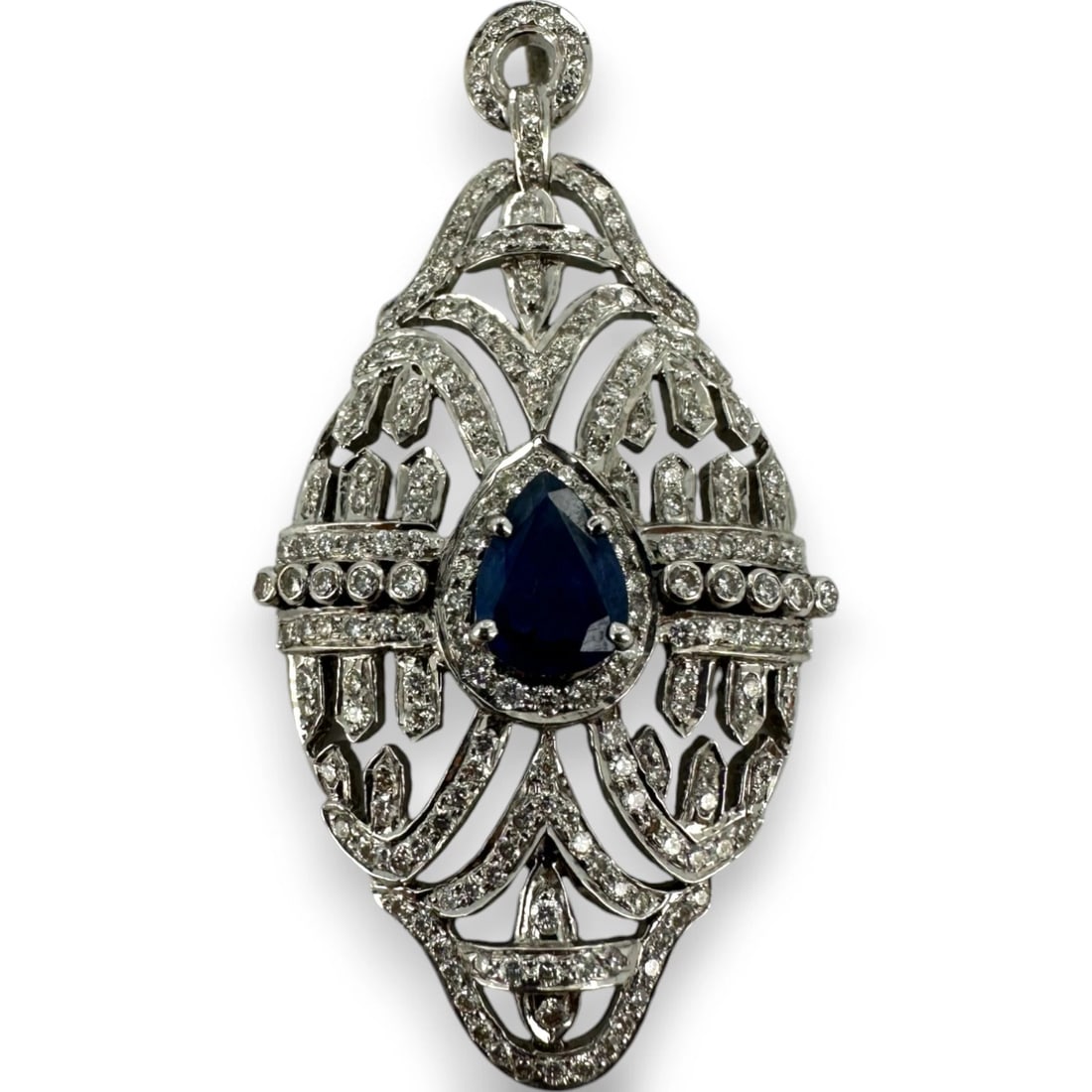 ART DECO APPHIRE & DIAMOND 14KT WHITE GOLD PENDANT: Art Deco apphire & Diamond 14kt White Gold Pendant Brand: Unbranded Type: Pendant Material: 14k White Gold Main Stone/Creation Sapphire Color: White Size: Length x Width of Pendant - 2.00" x 1.09"