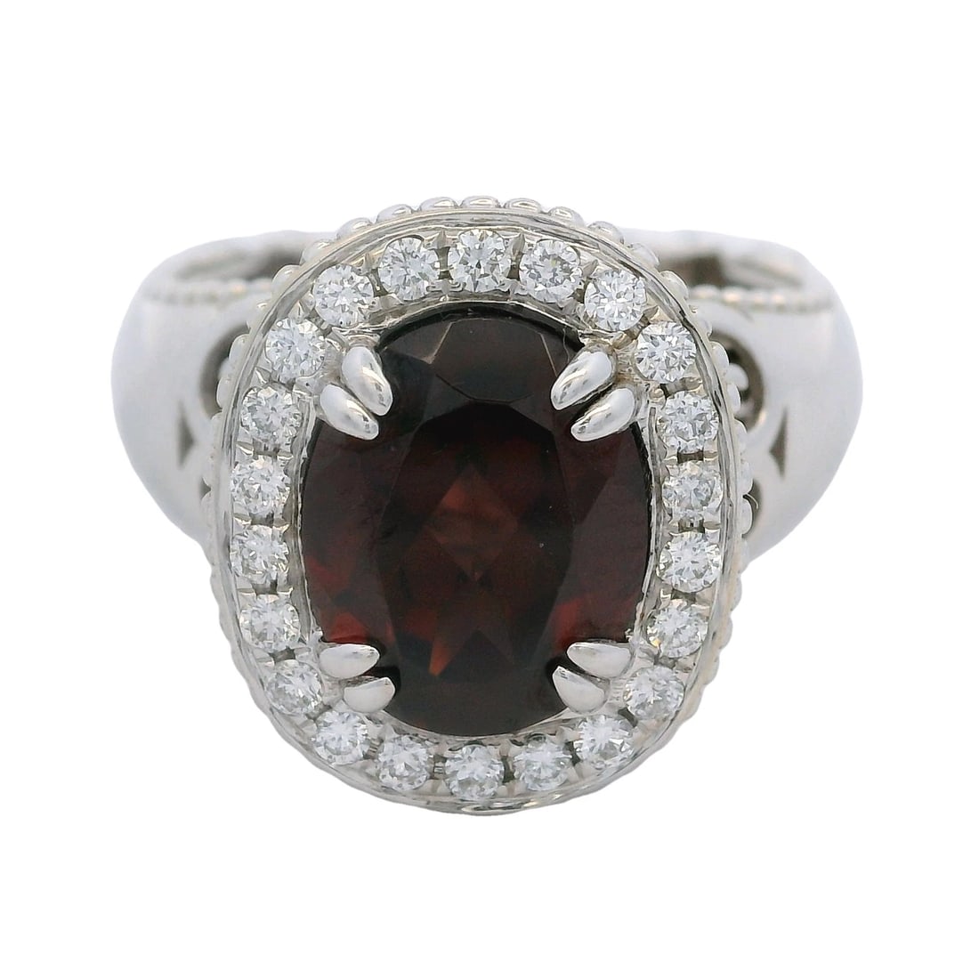 WHITE GOLD OVAL GARNET COCKTAIL SWIRL RING DIAMOND: White Gold Oval Garnet Cocktail Swirl Ring Diamond Brand: SNJ Type: Ring Material: 14k White Gold Main Stone/Creation Natural Color: White Size: 7 US Accessories: None Accessories Notice: