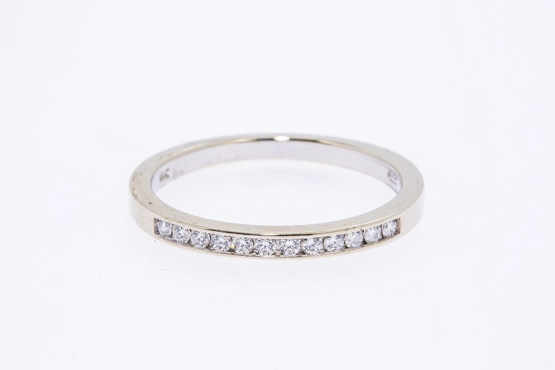 BLUE NILE DIAMOND LINE CHANNEL ANNIVERSARY BAND RING: Blue Nile Diamond Line Channel Anniversary Band Ring Brand: Blue Nile Type: Ring Material: 18K 750 White Gold Main Stone/Creation Natural Color: White Size: 7.75 US Accessories: None Acces