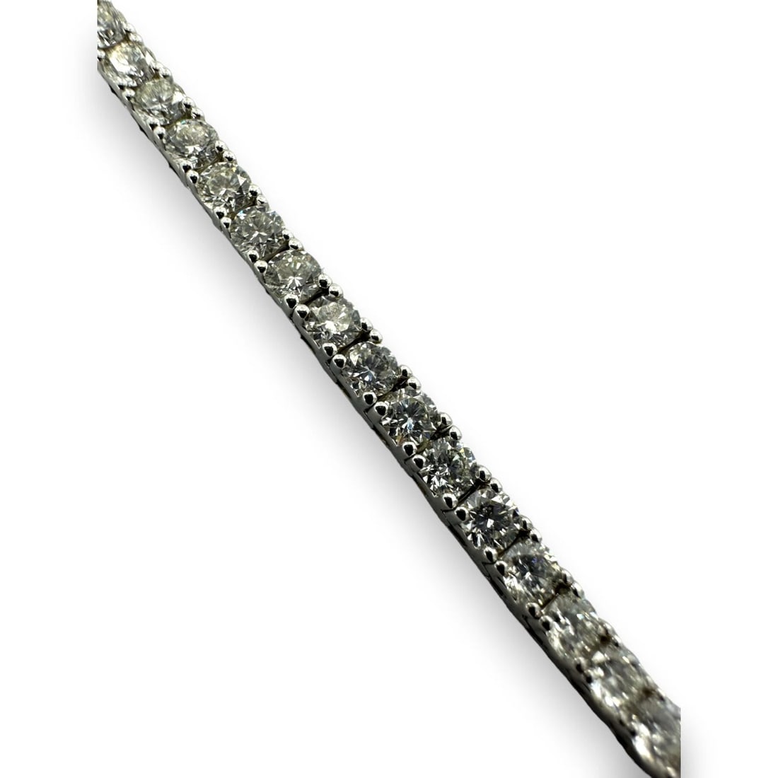 UNIQUE DESIGNS DIAMOND BRACELET 14K WHITE GOLD: Unique Designs Diamond Bracelet 14k White Gold Brand: Unique Designs Type: Bracelet Material: 14k White Gold Main Stone/Creation Natural Color: White Size: Length - 7" Width - 2.8mm Accessories: