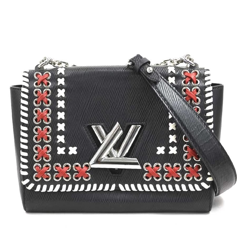 LOUIS VUITTON EPI TWIST MM SHOULDER BAG: LOUIS VUITTON Epi Twist MM Shoulder Bag Brand: LOUIS VUITTON Type: Shoulder Bag Material: Epi Leather Color: Black X White X Red Size: W:9.1inx H:7.1inx D:3.7in Shoulder Length: 46.5in Accessorie