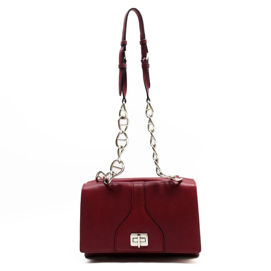 PRADA SHOULDER BAG DARK RED LEATHER: PRADA Shoulder Bag Dark Red leather Brand: PRADA Type: Shoulder Bag Material: leather Color: Dark Red Size: W:10.2inx H:7.1inx D:2.0in Shoulder Length: 34.3in Accessories: None Accessories