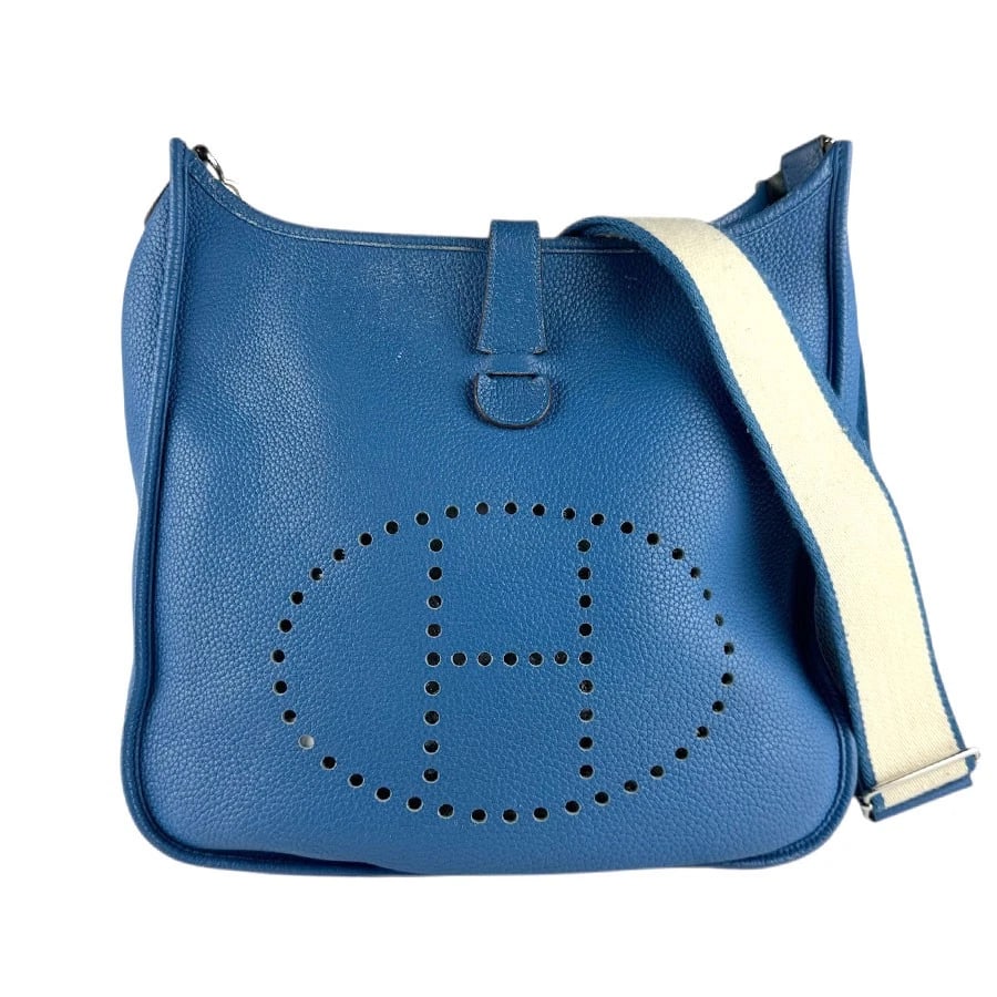 HERMES EVELYNE ? PM CROSSBODY SHOULDER BAG: HERMES Evelyne ? PM Crossbody Shoulder Bag Brand: HERMES Type: Crossbody Shoulder Bag Material: Leather Color: Blue/Off White Size: W:12.2inx H:11.8inx D:3.5in Shoulder Length: 37.4in Accessories
