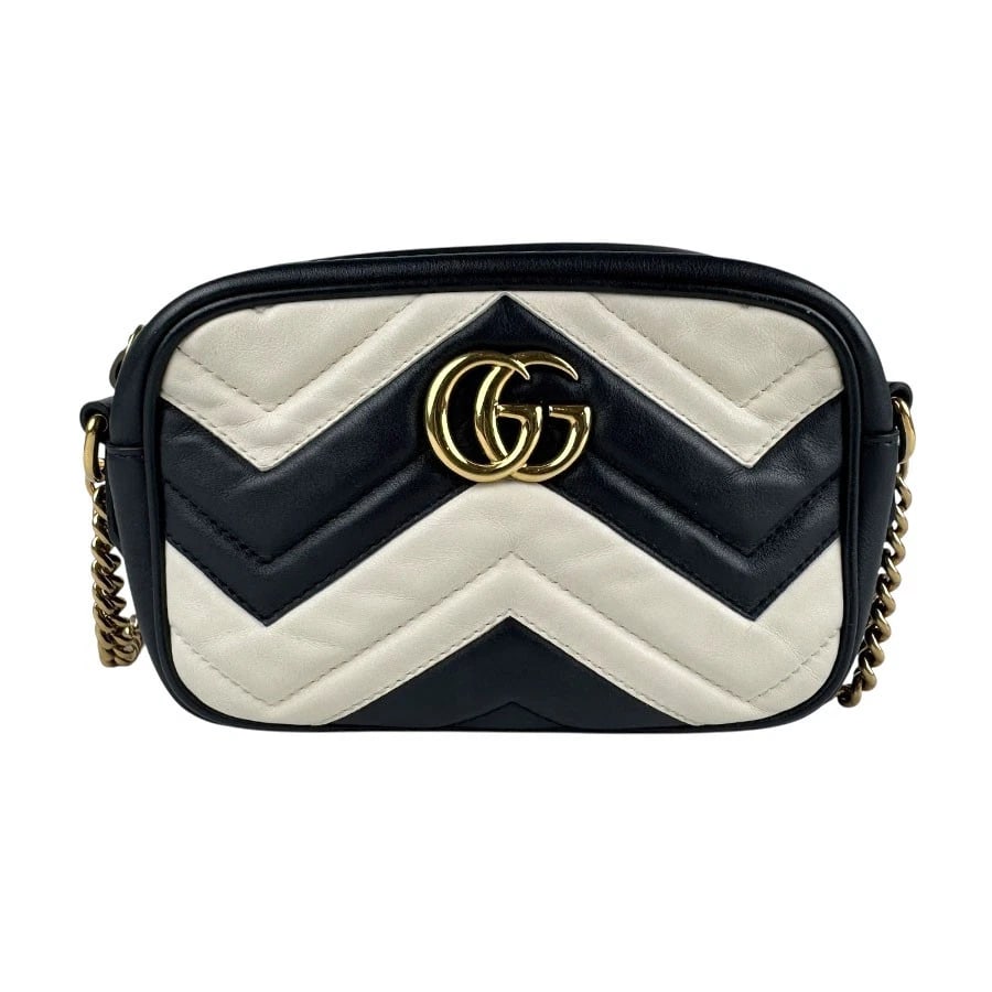 GUCCI GG MARMONT CROSSBODY SHOULDER BAG: GUCCI GG Marmont Crossbody Shoulder Bag Brand: GUCCI Type: Shoulder Bag Material: Leather Color: BlackxOff White Size: W:5.5inx H:4.7inx D:2.4in Shoulder Length: 51.2in Accessories: None A