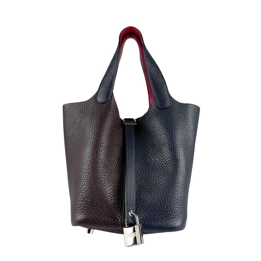 HERMES PICOTIN LOCK KAZAK PM HANDBAG BLUE: HERMES Picotin Lock Kazak PM Handbag Blue Brand: HERMES Type: Handbag Material: Taurillon Clemence Color: Blue Nuit X Rouge Serie X Raspberry Size: W:5.1inx H:7.5inx D:7.1in Handle Length:12.2in