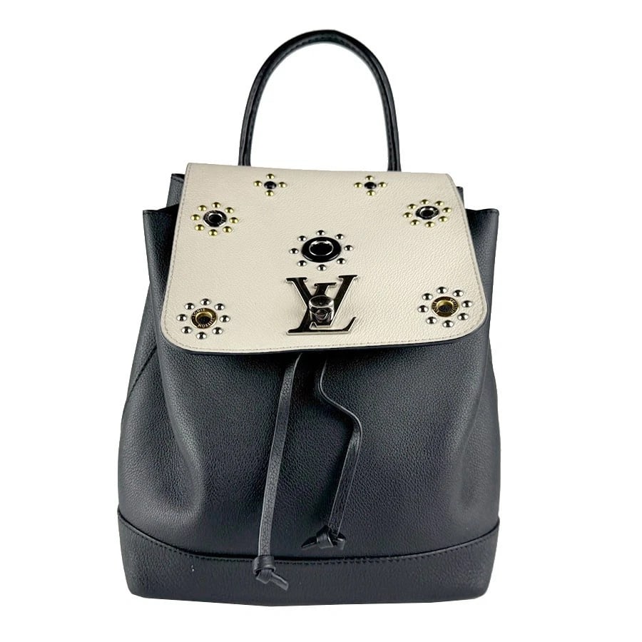 LOUIS VUITTON LOCKME BACKPACK BLACK/OFF WHITE: LOUIS VUITTON Lockme Backpack Black/Off White Brand: LOUIS VUITTON Type: Backpack Material: Leather Color: Black/Off White Size: W:8.3inx H:9.1inx D:5.1in Handle Length:10.6in Shoulder Length: 31.