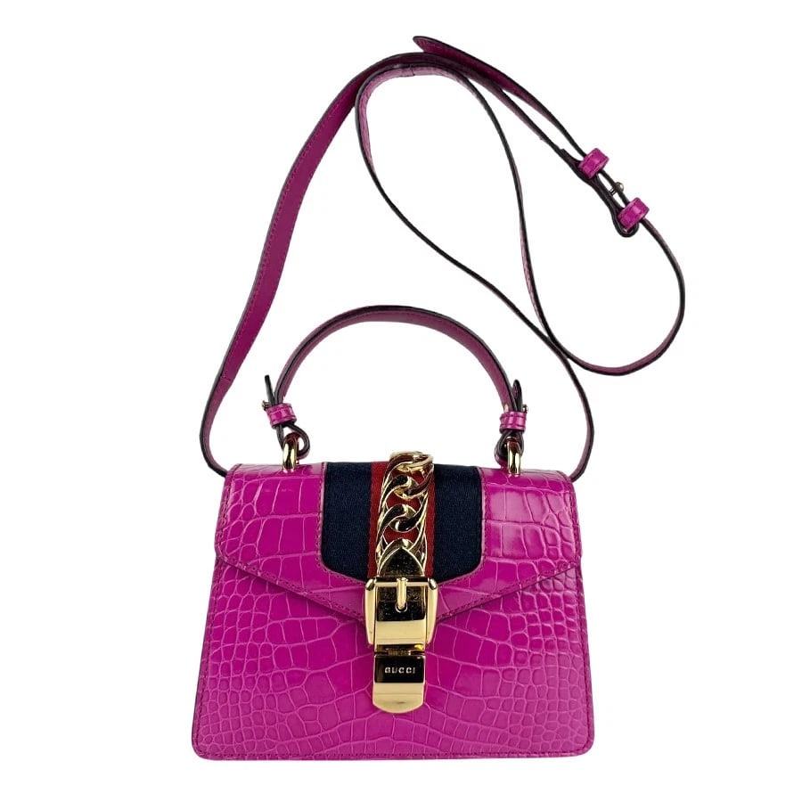 GUCCI SYLVIE HANDBAG SHOULDER BAG MAGENTA LEATHER/GOLDTONE: GUCCI Sylvie Handbag Shoulder Bag Magenta Leather/Goldtone Brand: GUCCI Type: Handbag Material: leather Color: Magenta Size: W:7.9inx H:5.9inx D:3.1in Handle Length:10.6in Shoulder Length: 49.2in