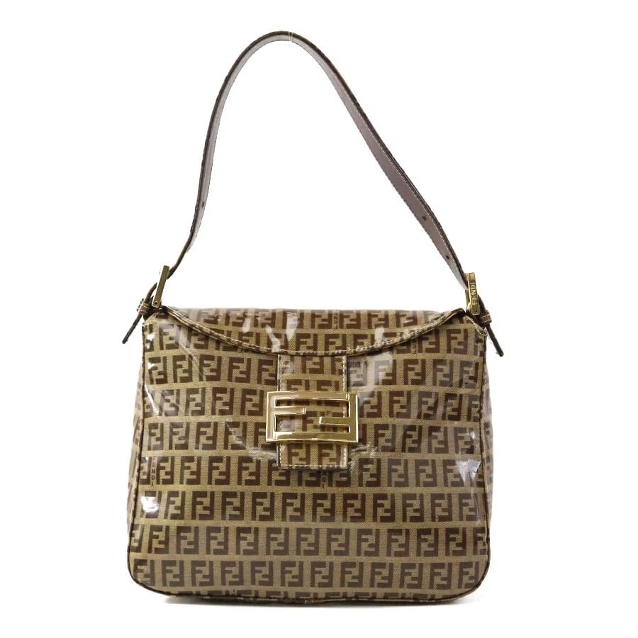 FENDI ZUCCINO SHOULDER BAG BROWN PVC/GOLDTONE: FENDI Zuccino Shoulder Bag Brown PVC/Goldtone Brand: FENDI Type: Shoulder Bag Material: PVC Color: Brown Size: W:9.4inx H:7.9inx D:4.7in Shoulder drop:3.9 ~ 6.7in Accessories: None Accesso