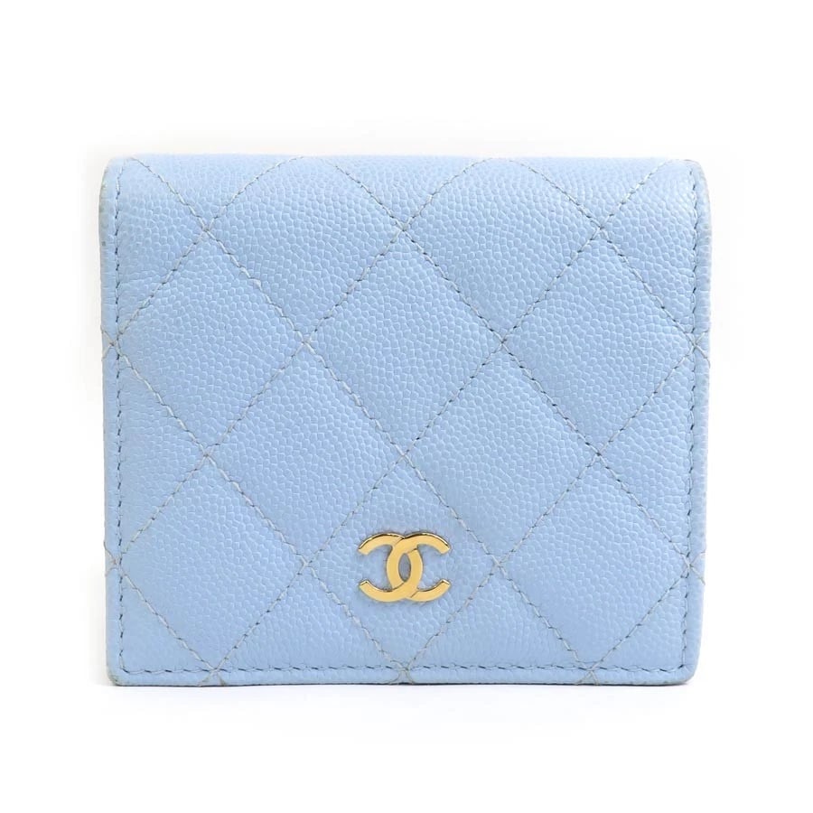CHANEL BIFOLD WALLET LIGHT BLUE LEATHER: CHANEL Bifold Wallet Light Blue Leather Brand: CHANEL Type: Bifold Wallet Material: Caviar skin leather Color: Light Blue Size: W:3.9inx H:3.5inx D:1.2in Accessories: None Accessories Noti