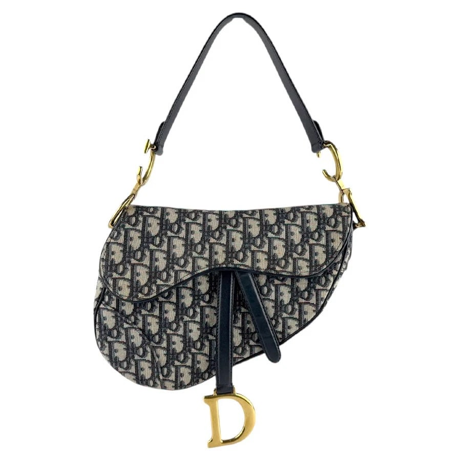 CHRISTIAN DIOR OBLIQUE SADDLE BAG SHOULDER BAG: Christian Dior Oblique Saddle Bag Shoulder Bag Brand: Christian Dior Type: Shoulder Bag Material: canvas Color: Navy Size: W:6.3inx H:7.9inx D:1.2in Handle Length:20.9in Accessories: None