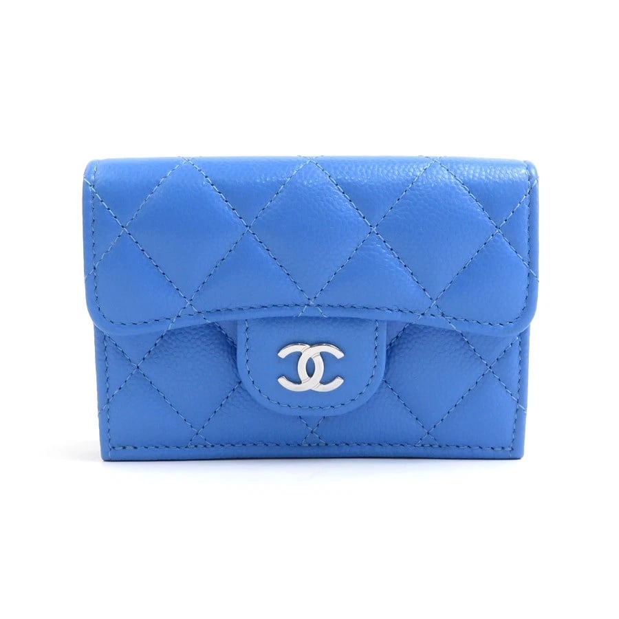 CHANEL MATELASSE TRIFOLD WALLET BLUE LEATHER/SILVERTONE: CHANEL Matelasse Trifold Wallet Blue Leather/Silvertone Brand: CHANEL Type: Tri-fold wallet Material: Caviar skin leather Color: Blue Size: W:4.1inx H:3.0inx D:1.6in Accessories: None Acce