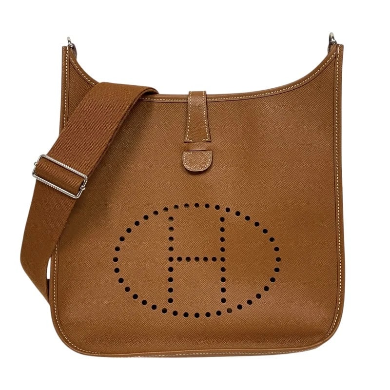 HERMES EVELYN 3 GM SHOULDER BAG: HERMES Evelyn 3 GM Shoulder Bag Brand: HERMES Type: Shoulder Bag Material: Epsom Color: Gold SilverHardware Size: W12.6 x H13.4x D3.9inch Shoulder:35.4inch Accessories: None Accessories No
