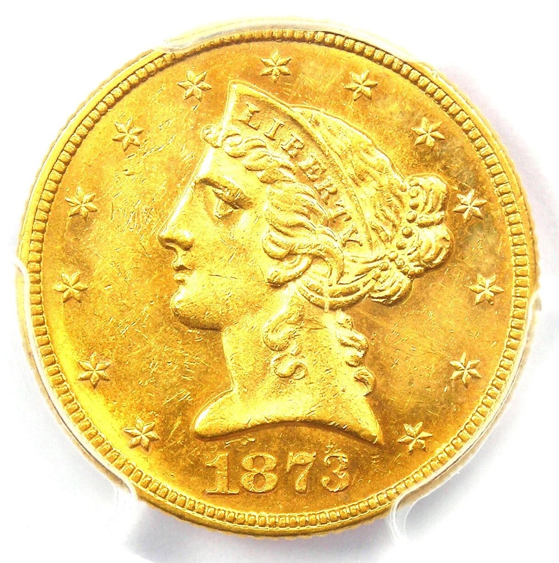 1873 LIBERTY GOLD HALF EAGLE $5 COIN: 1873 Liberty Gold Half Eagle $5 Coin Composition: Gold Year: 1873 Denomination: $5 Fineness: None Country of Origin: United States Accessories: None Accessories Notice: When purchasing pre