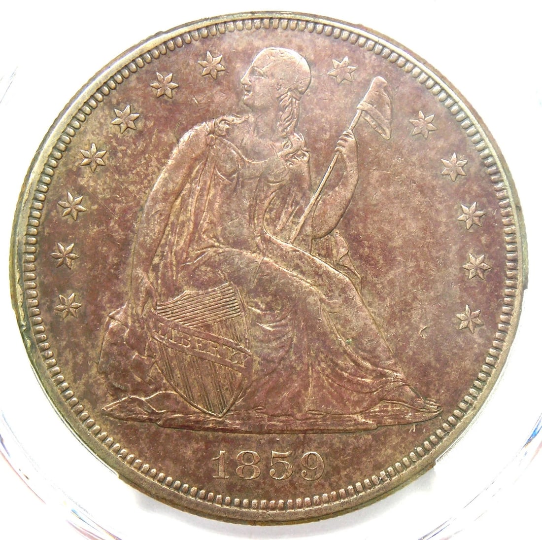 1859 SEATED LIBERTY SILVER DOLLAR $1 (1 of 2)