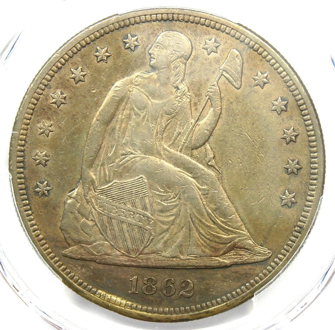 1862 SEATED LIBERTY SILVER DOLLAR: 1862 Seated Liberty Silver Dollar Composition: Silver Year: 1862 Denomination: $1 Fineness: None Country of Origin: None Accessories: None Accessories Notice: When purchasing pre-owned goo